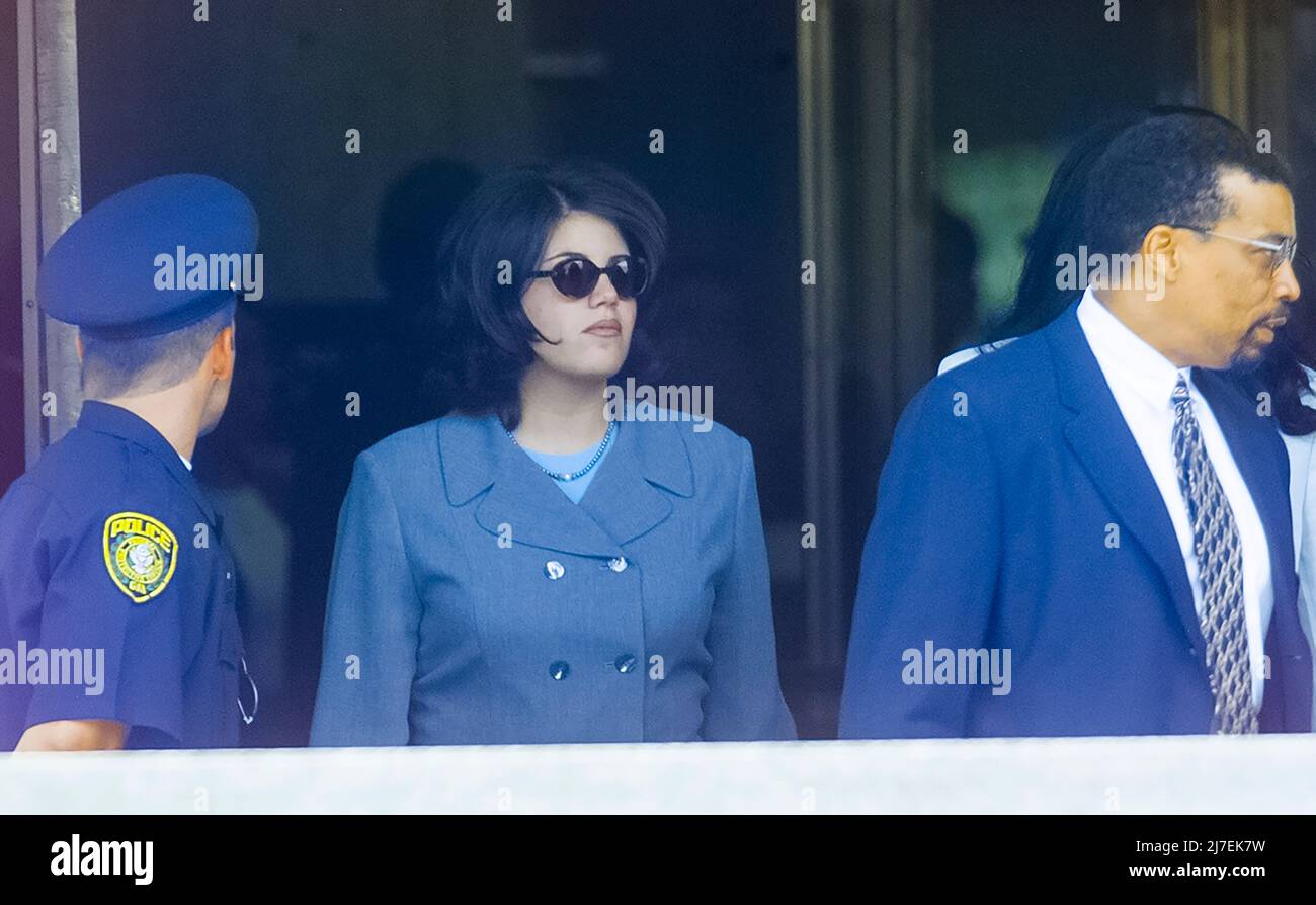 Monica Lewinsky leaves Federal Court in Washington DC after testifying against President Bill Clinton on August 20, 1998. Photo credit: Francis Specker Stock Photo