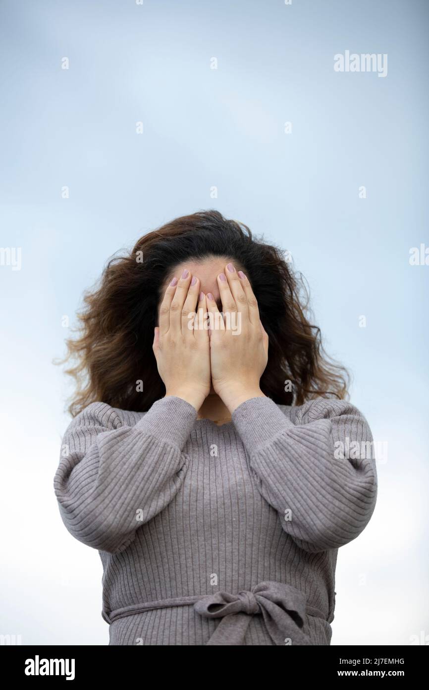 Woman head in hands embarrassed hi-res stock photography and images - Alamy