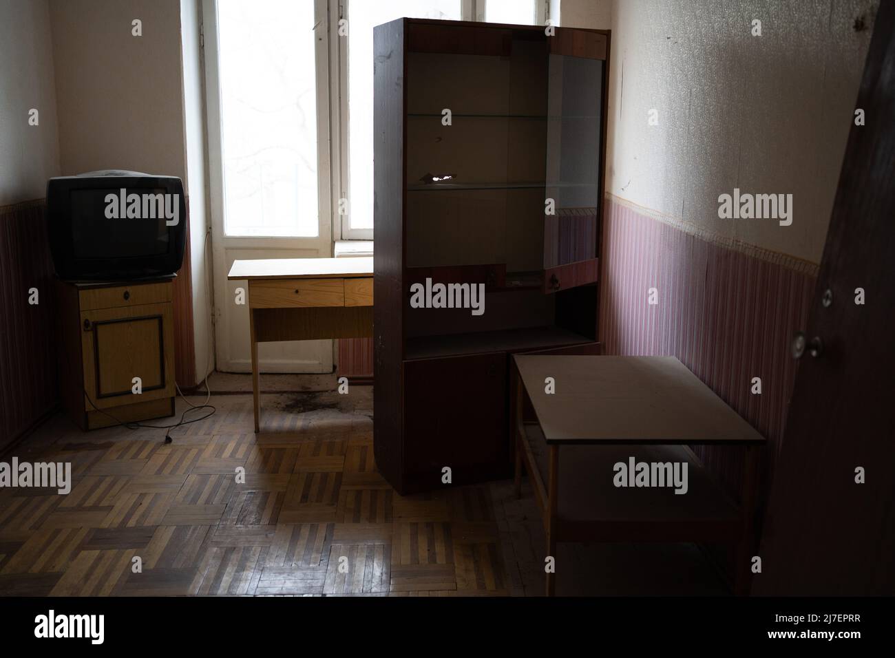 old abandoned room with dirty broken furniture Stock Photo