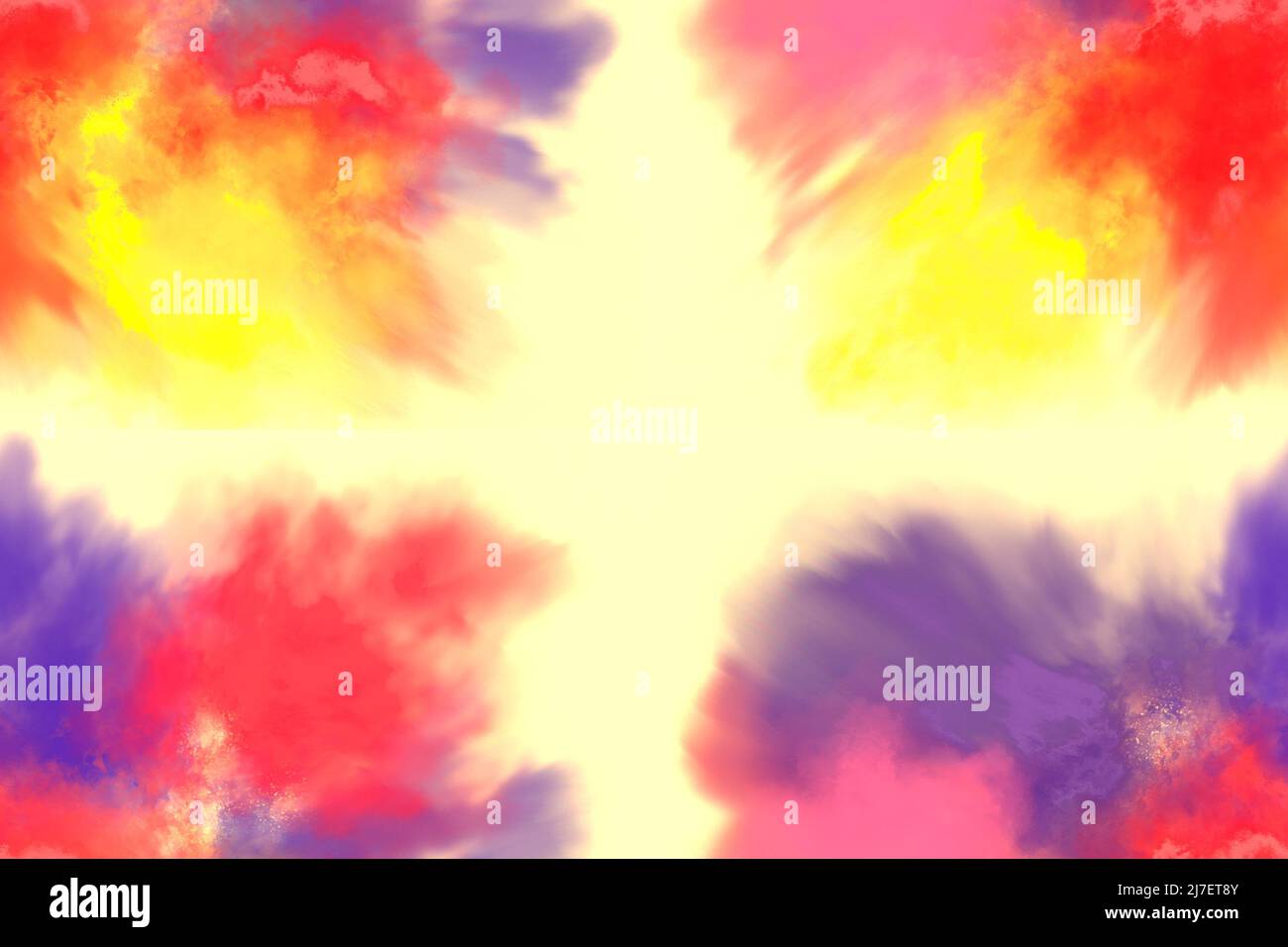 Powder puffs in mixed colors of yellow, red, pink and blue on a pastel