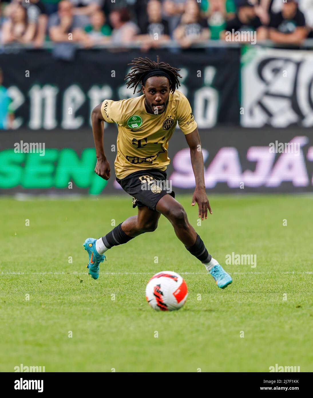 BUDAPEST, HUNGARY - AUGUST 13: (l-r) Tokmac Chol Nguen of Ferencvarosi TC  wins the ball from Arijan Ademi of GNK Dinamo Zagreb during the UEFA  Champions League Third Qualifying Round match between