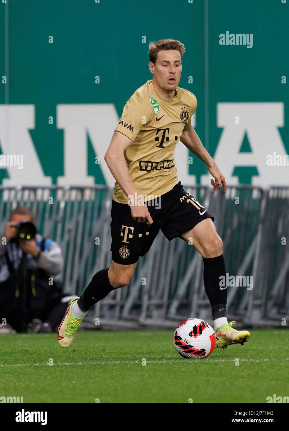 BUDAPEST, HUNGARY - MAY 11: Kristoffer Zachariassen of Ferencvarosi TC runs  with the ball during the Hungarian Cup Final match between Ferencvarosi TC  and Paksi FC at Puskas Arena on May 11