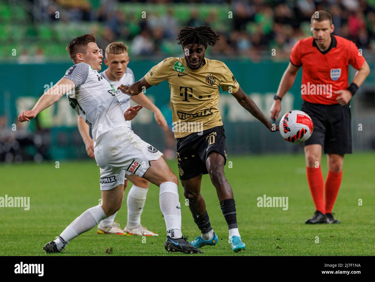 BUDAPEST, HUNGARY - AUGUST 29: (l-r) Tokmac Chol Nguen of Ferencvarosi TC  celebrates his goal in front of Gergo Lovrencsics of Ferencvarosi TC during  the UEFA Europa League Play-off Second Leg match