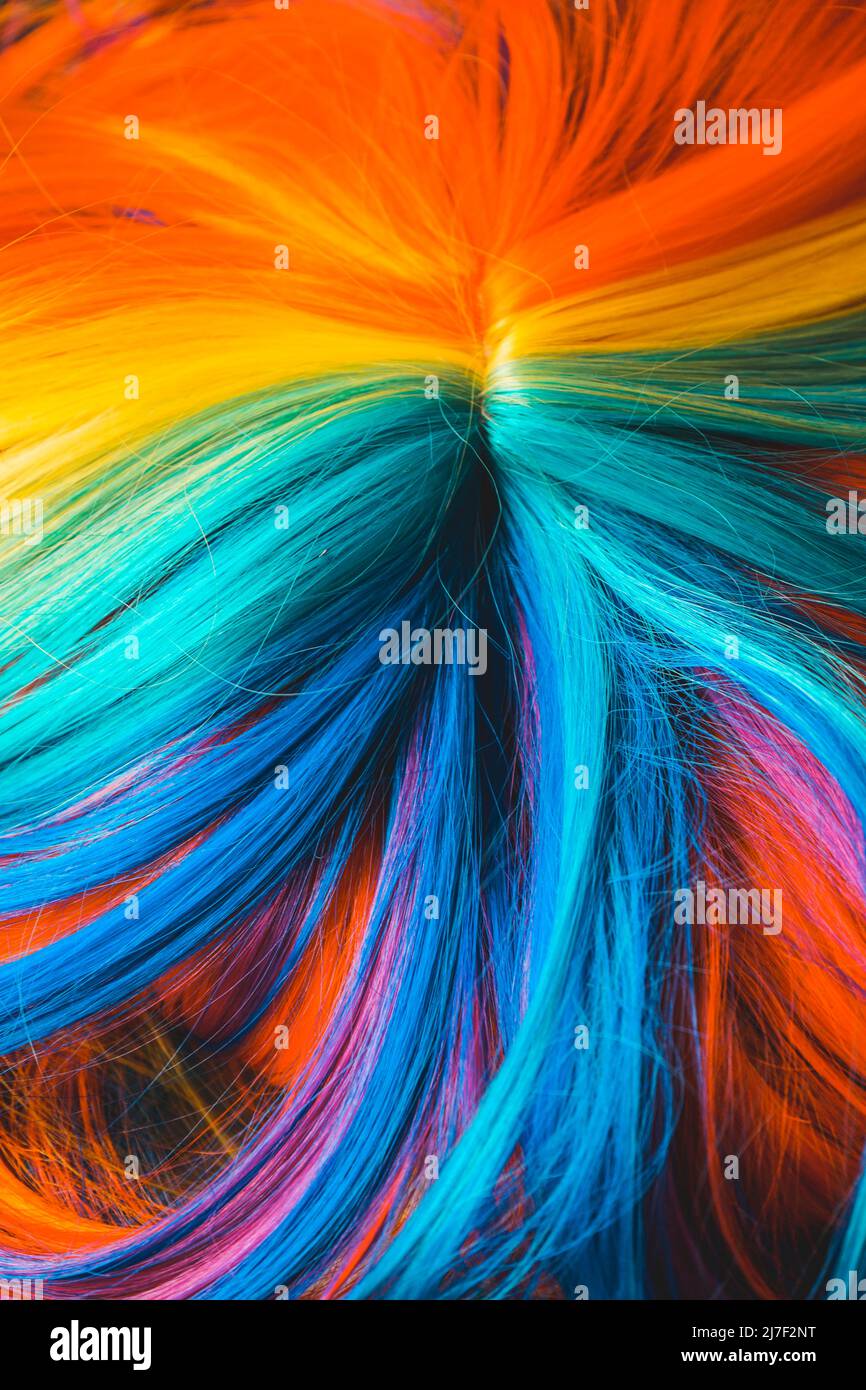 Textured image of a multi colored rainbow wig Stock Photo