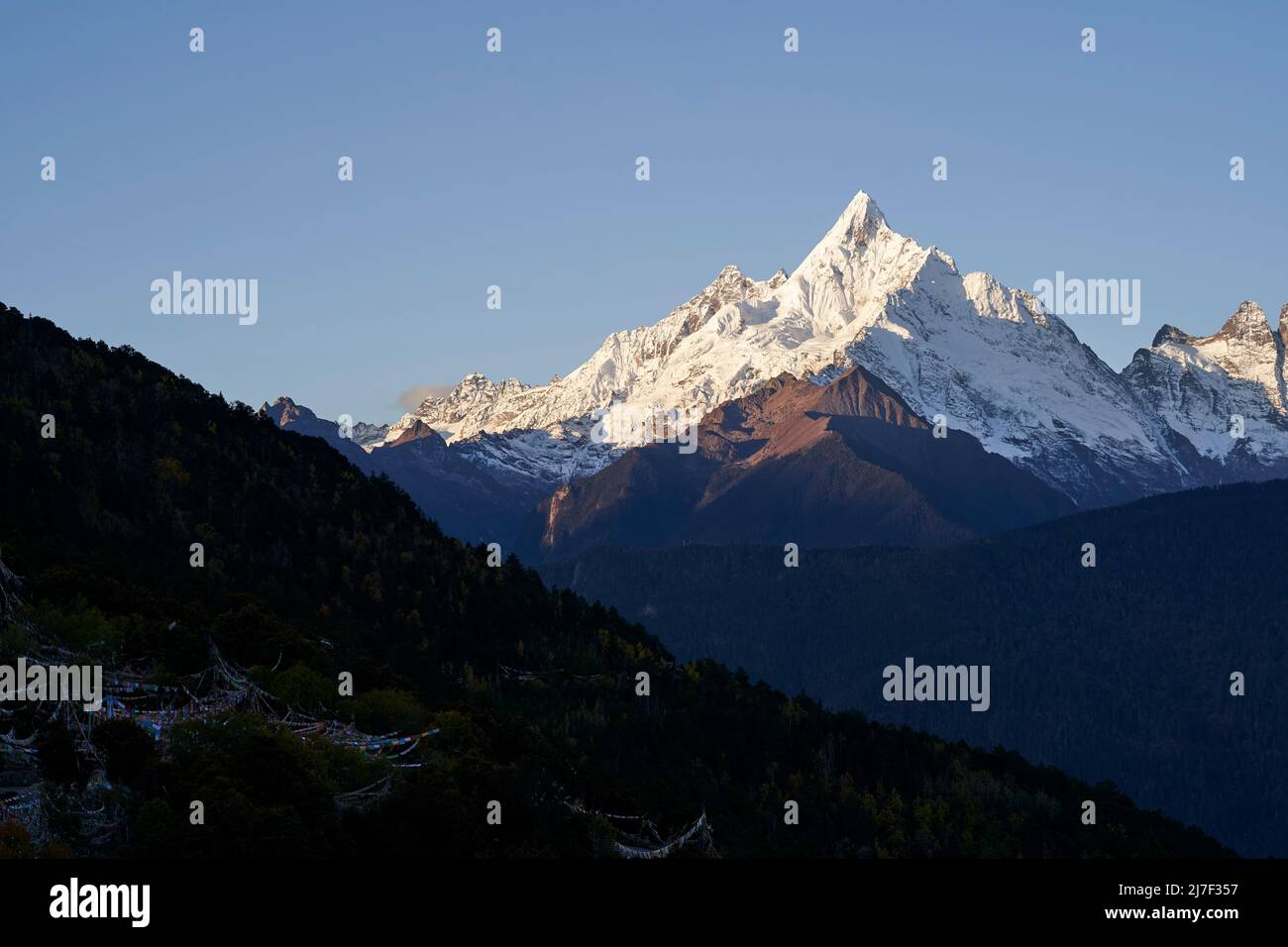 one of the peaks of meili snow mountain under the blue sky in yunnan province, china Stock Photo