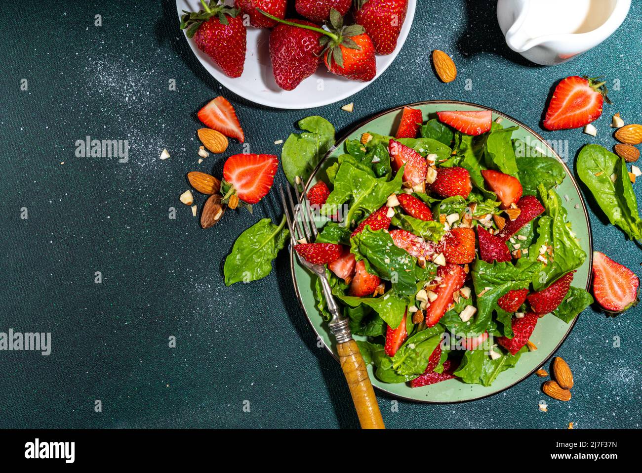 Strawberry, spinach and nuts salad. Healthy diet spring summer salad