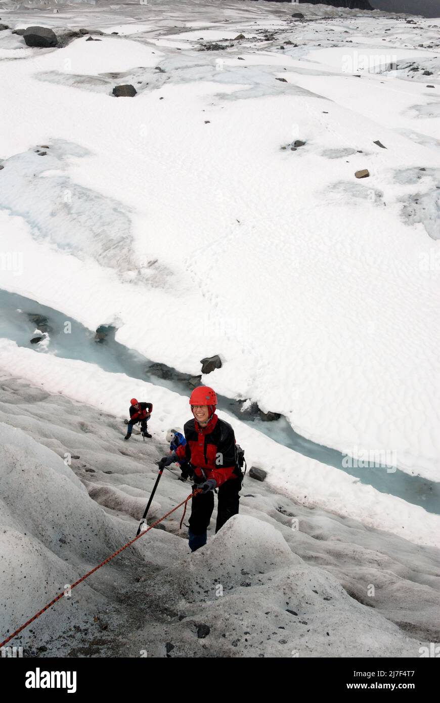 Tourist abseiling on Mendenhall Glacier, near Juneau. Stock Photo