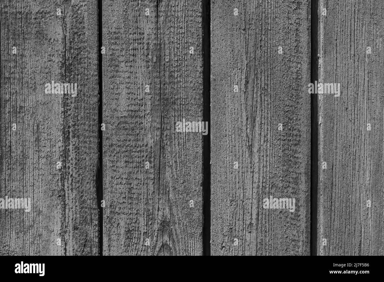 old dark gray wooden fence made of planks background Stock Photo - Alamy