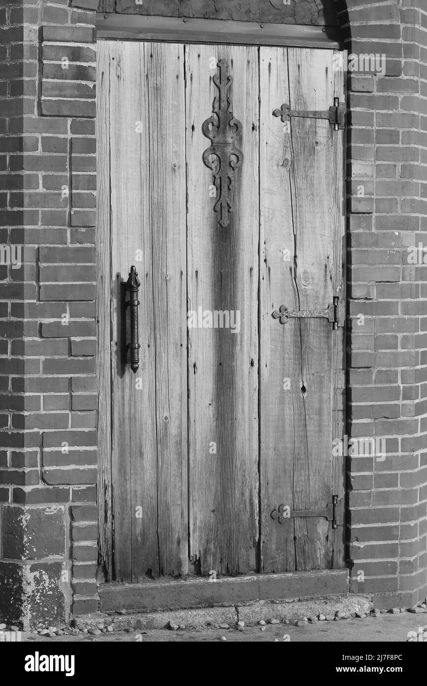 Vintage worn wooden door in black and white Stock Photo - Alamy