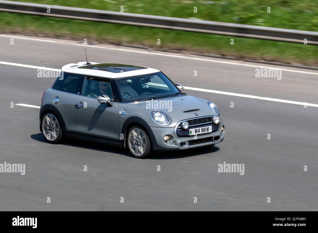 2015 Mini Cooper SD 170 Start Stop grey 2dr hatchback 1995cc diesel driving on the M61 Motorway, Manchester, UK Stock Photo