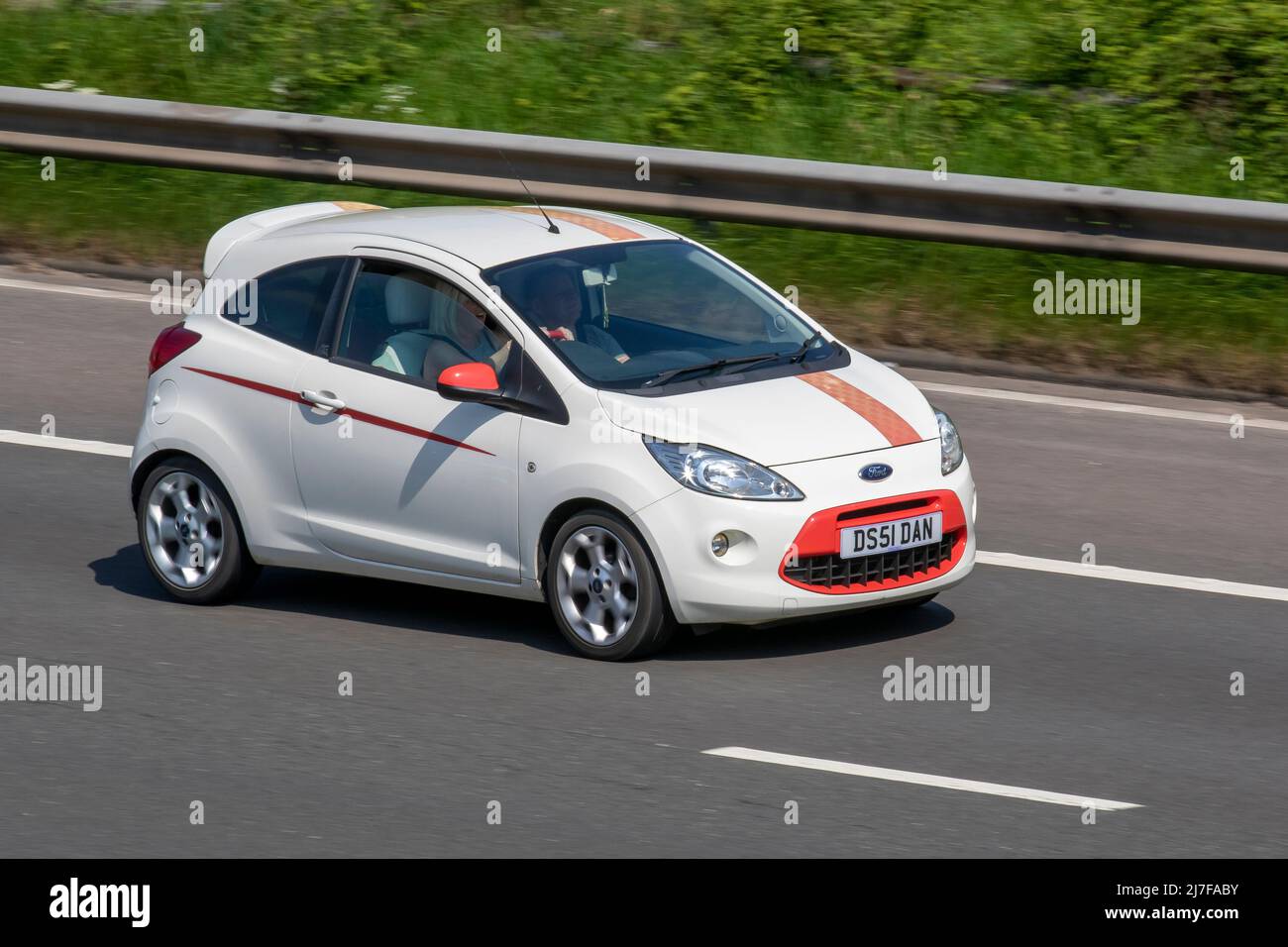 2011 white Ford KA Zetec 1242cc petrol 2dr small city car; driving on the M61 Motorway, Manchester, UK Stock Photo
