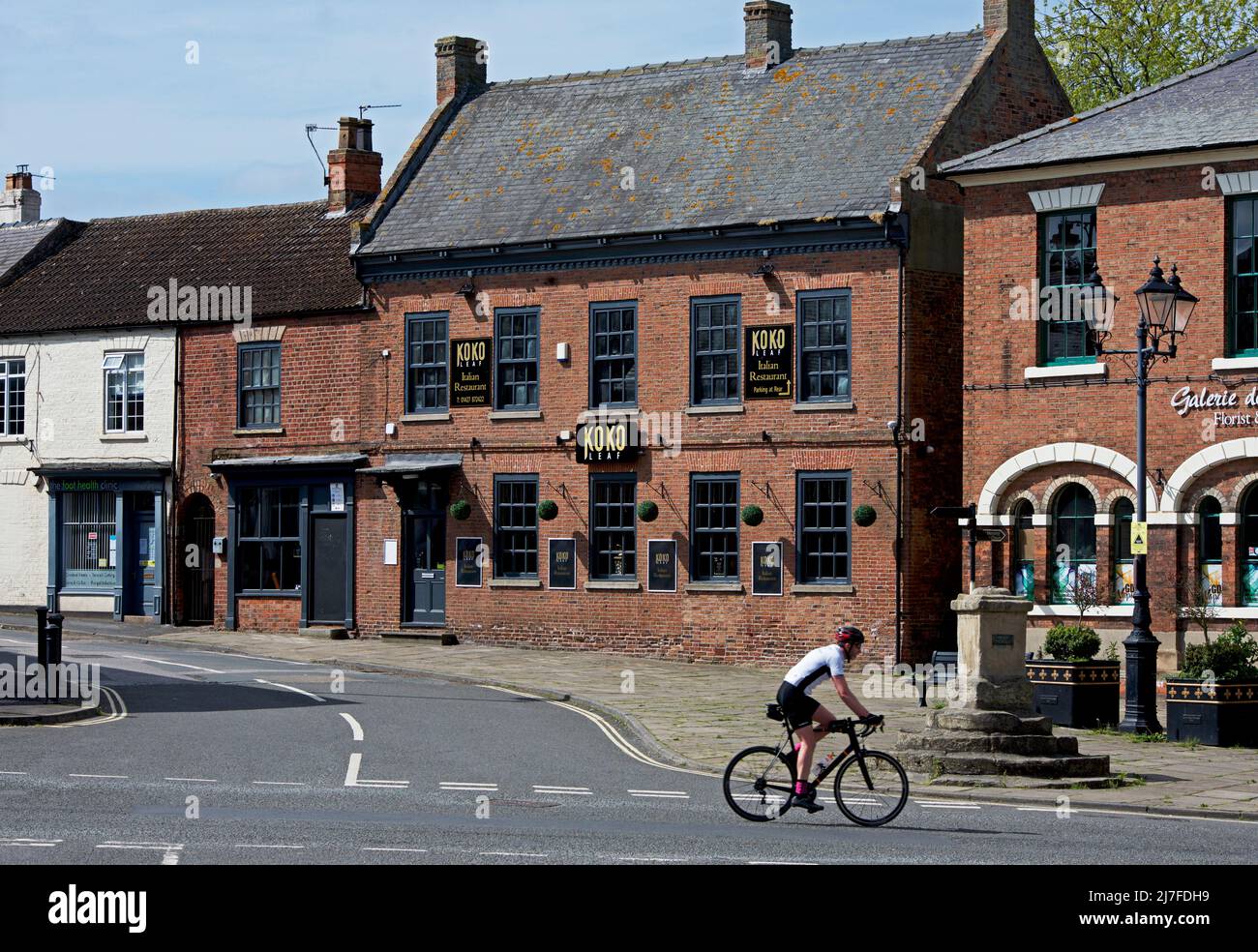 Cyclist in Epworth, North Lincolnshire, England UK Stock Photo
