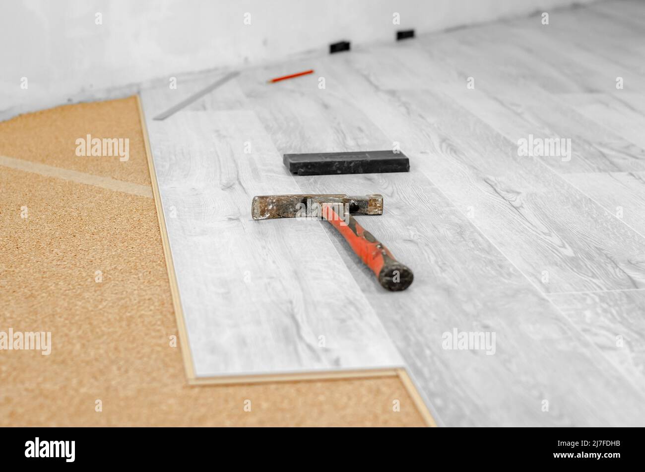 Professional laying of a floor covering a laminate. Laying laminate