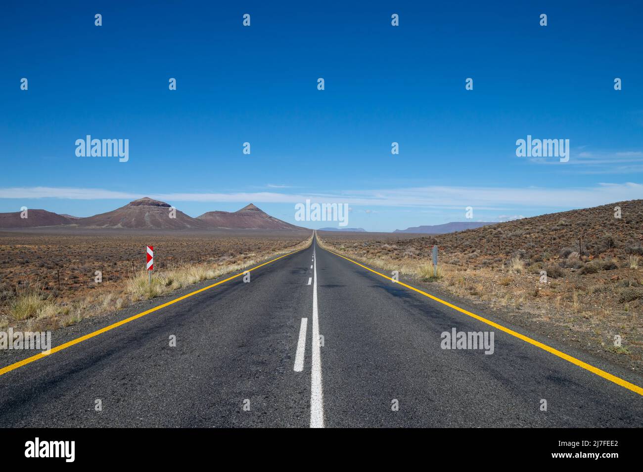An empty road stretches into the distance in the Northern Cape, South ...