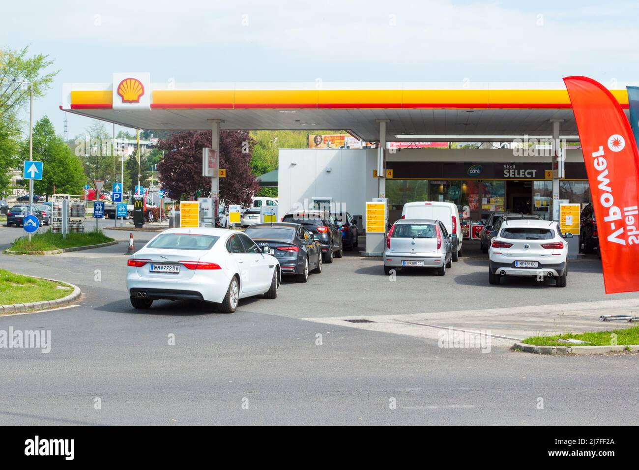 Austrian cars queue at Shell petrol gas station in Hungary as fuel