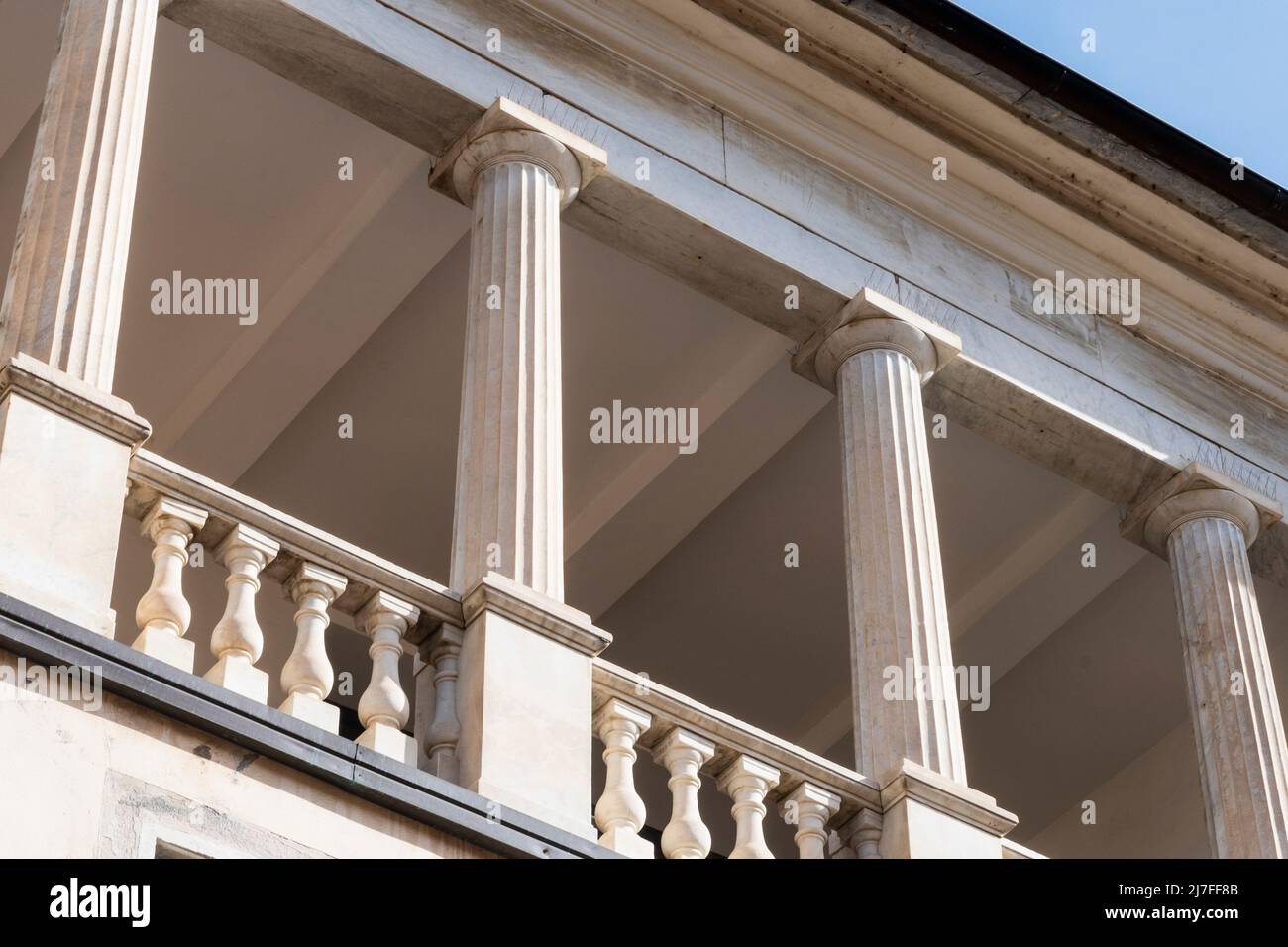 Balcony surrounded by a balustrade and columns in Italian marble Stock Photo