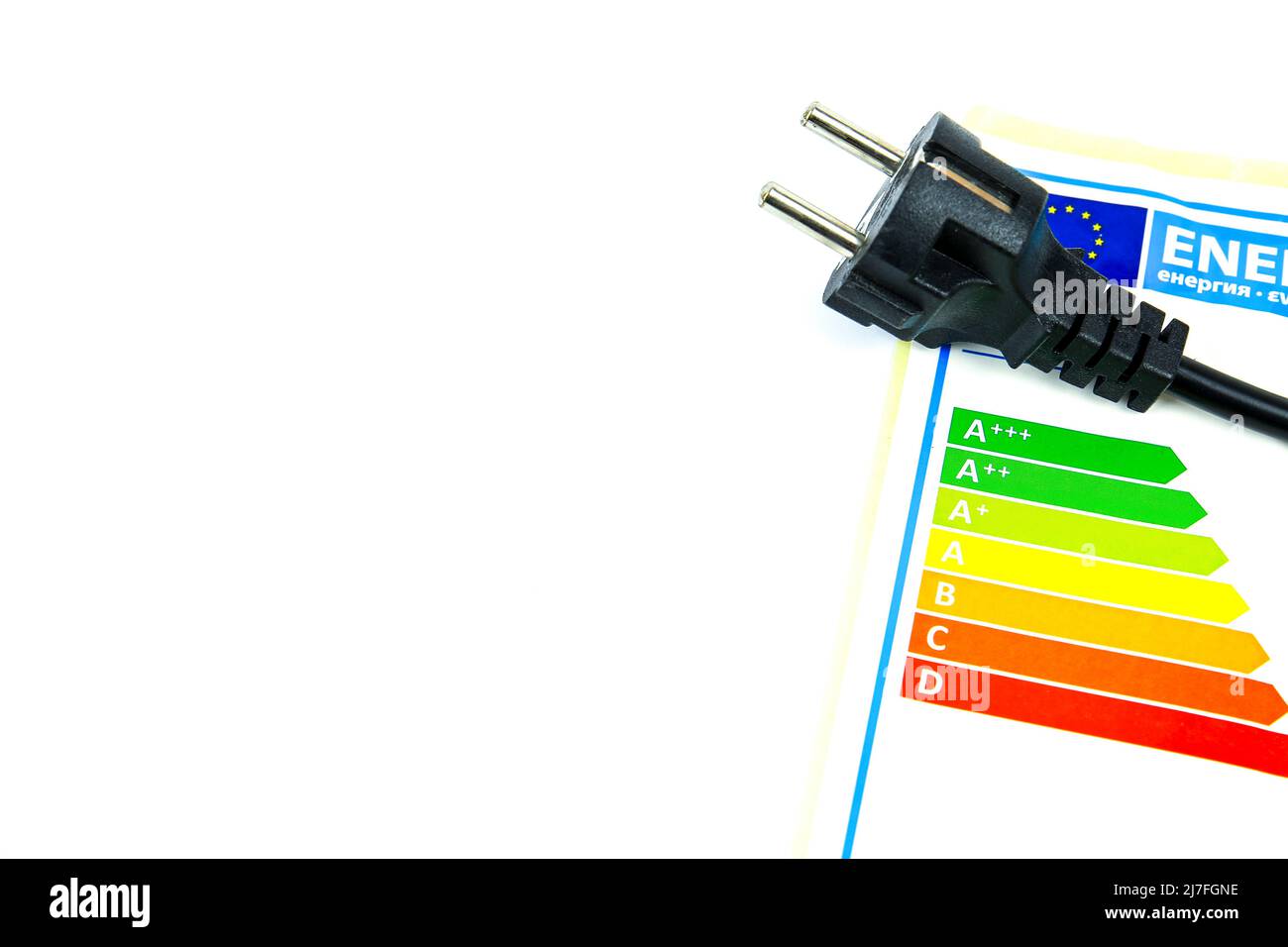 European Union Energy Label next to black pin power plug Stock Photo ...