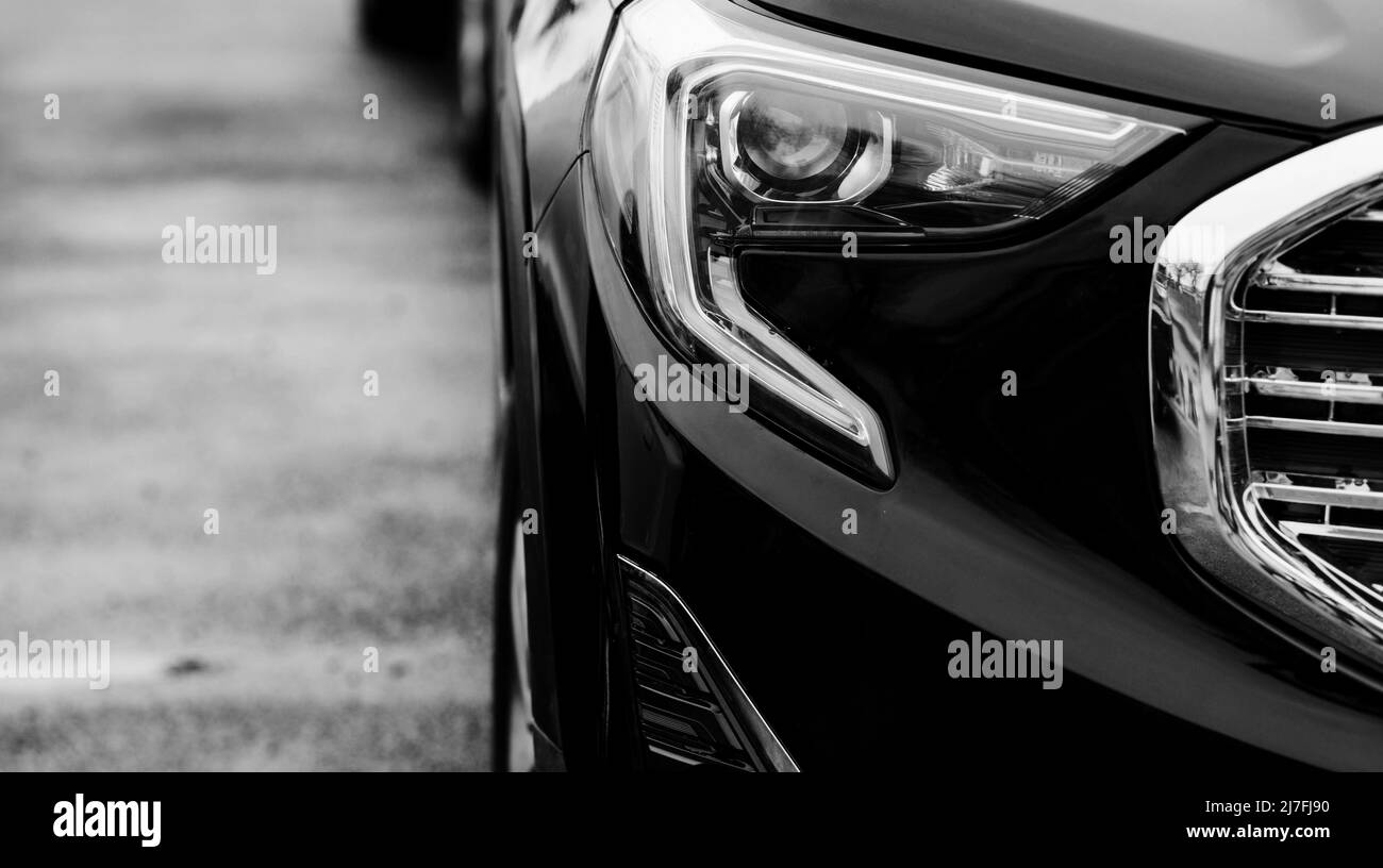 Headlight lamp of new cars. LED headlights modern car. Closeup