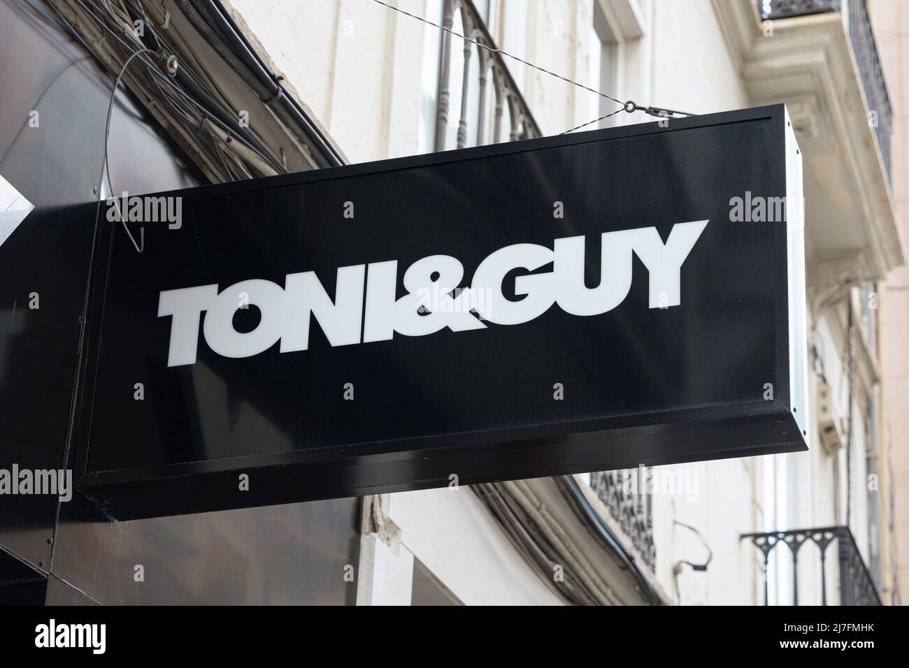 VALENCIA, SPAIN - MAY 05, 2022: Toni & Guy is a British international chain of hairdressing salons Stock Photo