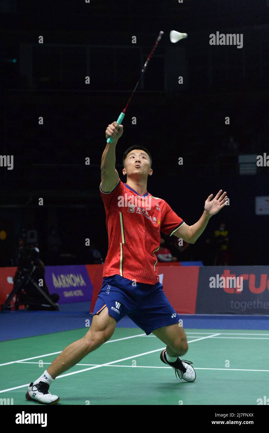 Bangkok, Thailand. 9th May, 2022. Lu Guangzu of China competes against  Christo Popov of France during a group B match at the Thomas Cup badminton  tournament in Bangkok, Thailand, May 9, 2022.