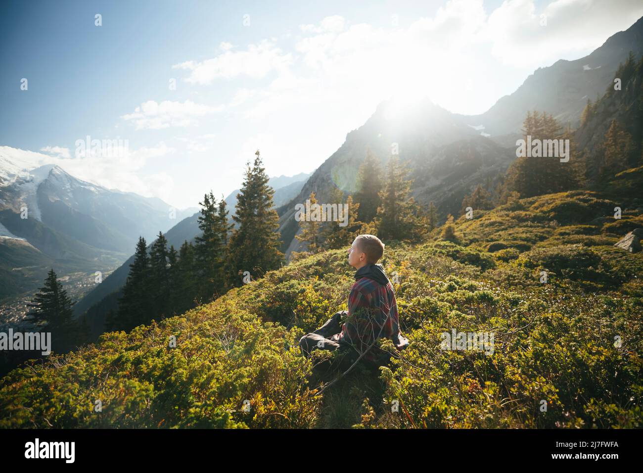 Back view female hiker sitting hi-res stock photography and images - Alamy