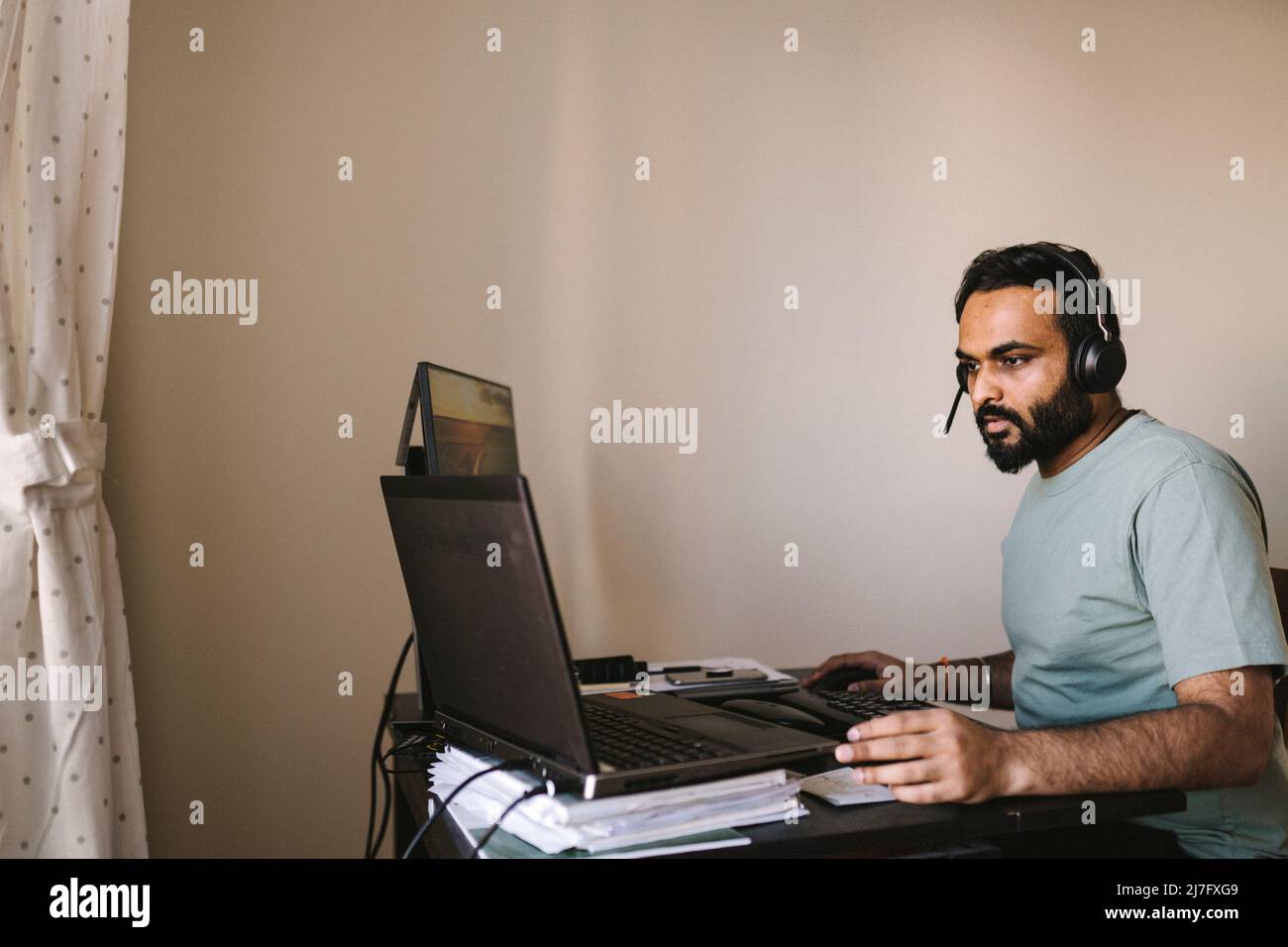 Man working from home Stock Photo