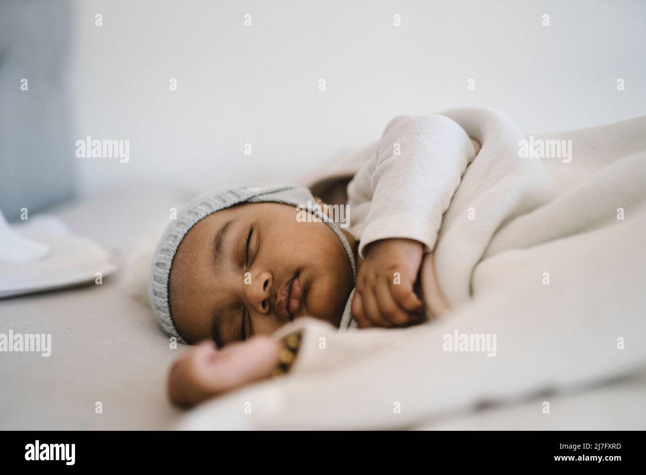 Baby sleeping in bed Stock Photo Alamy