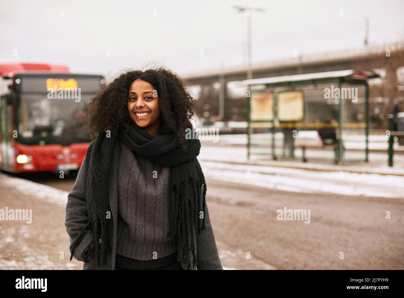 Smiling woman looking at camera Stock Photo