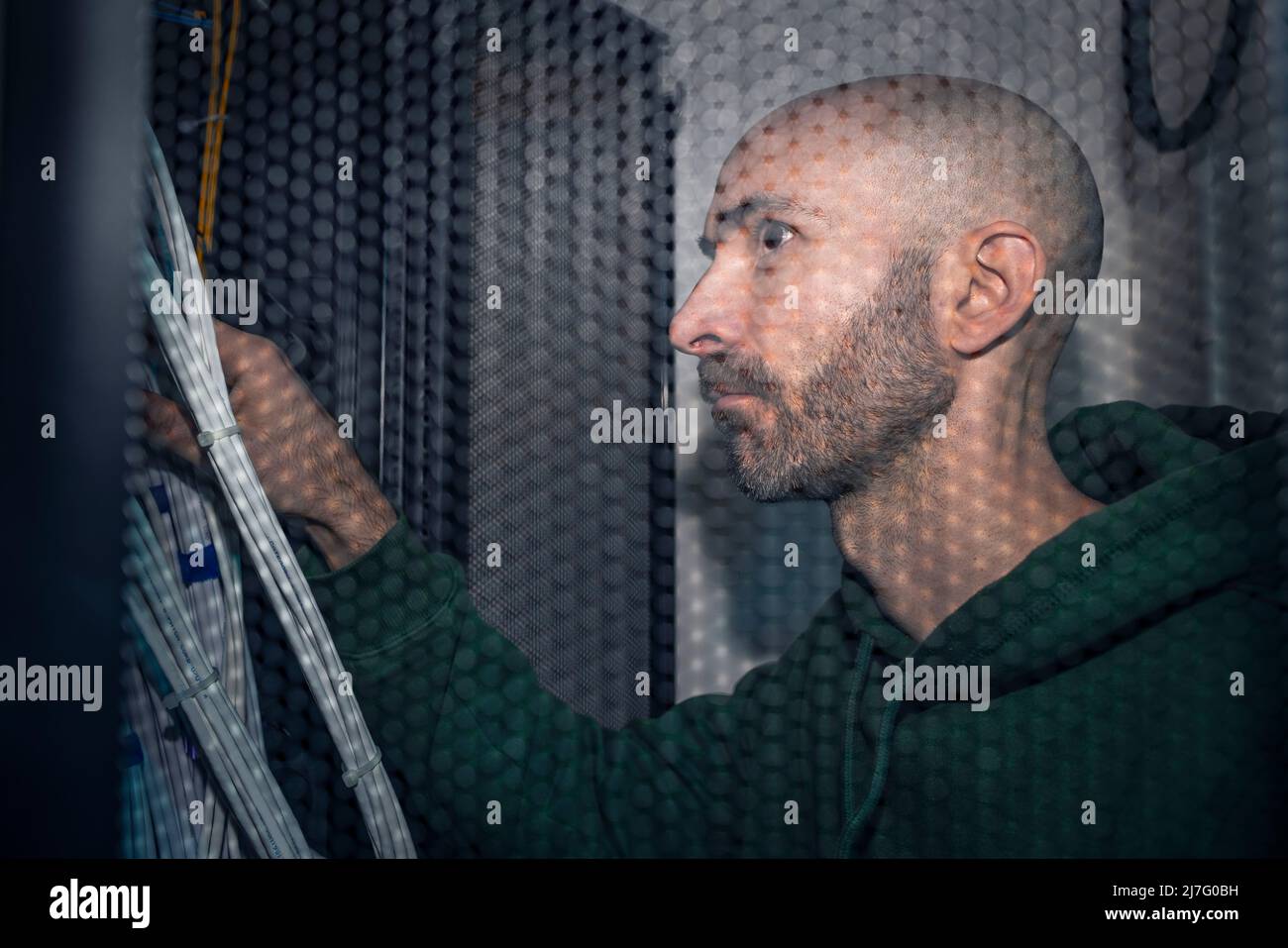 IT technician working in server room Stock Photo