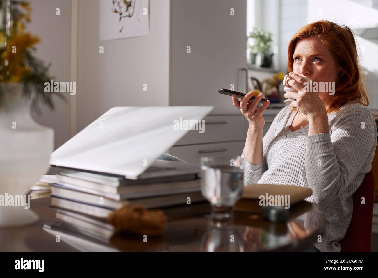 Woman having coffee break Stock Photo