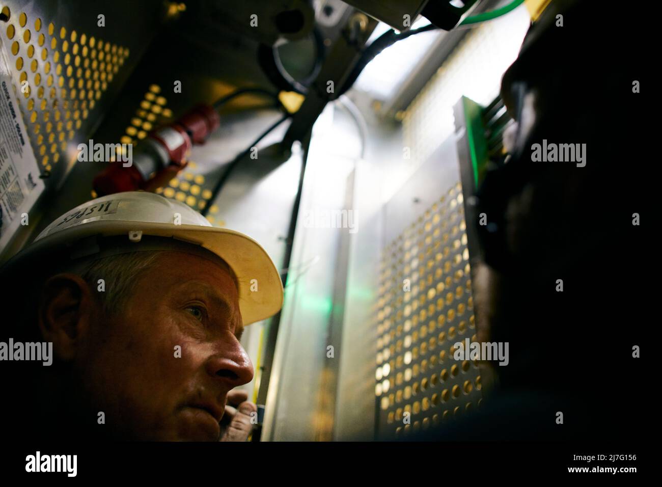Engineer working in wind turbine Stock Photo