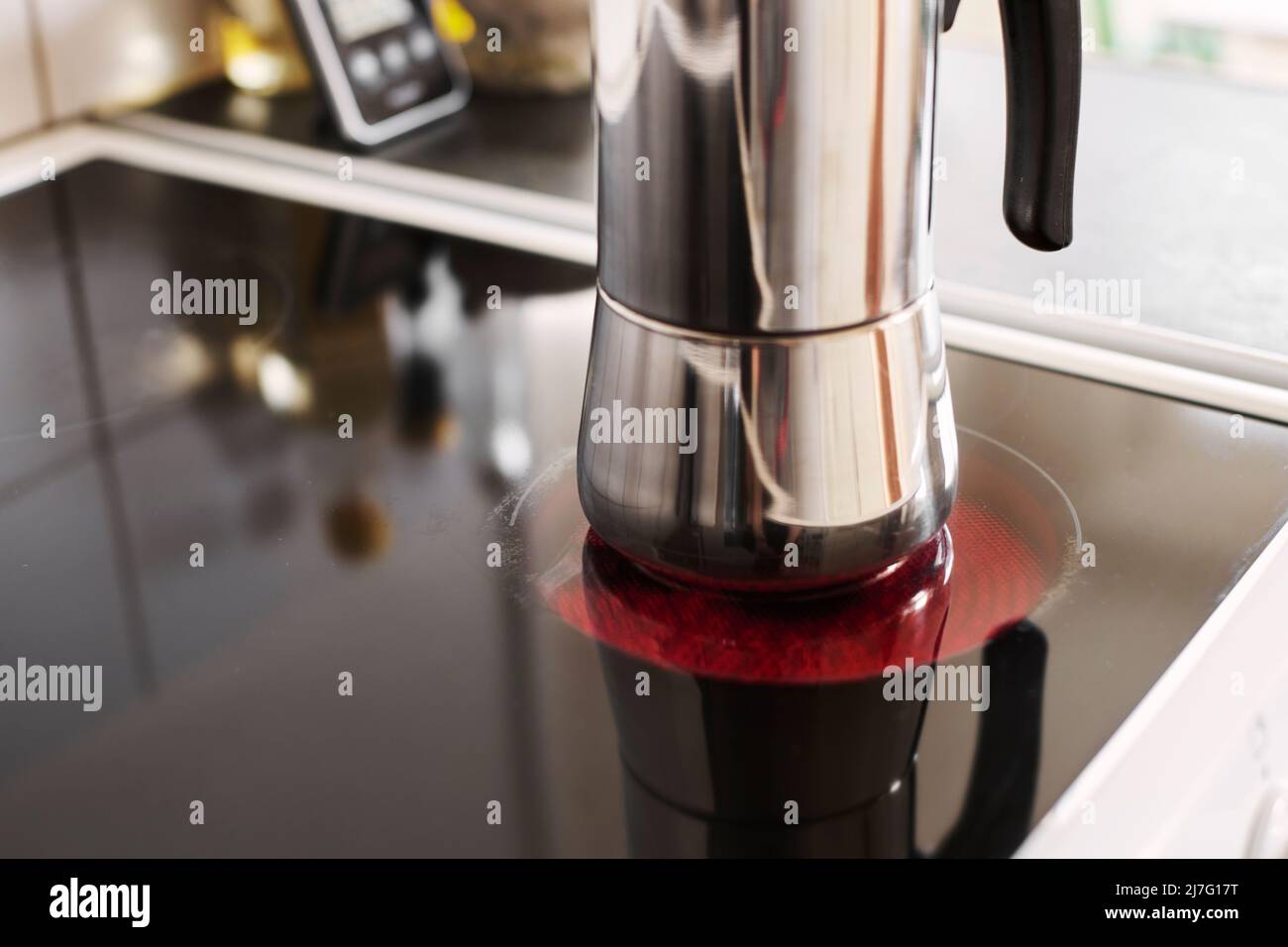 Close up of coffee maker on electric stove burner Stock Photo Alamy