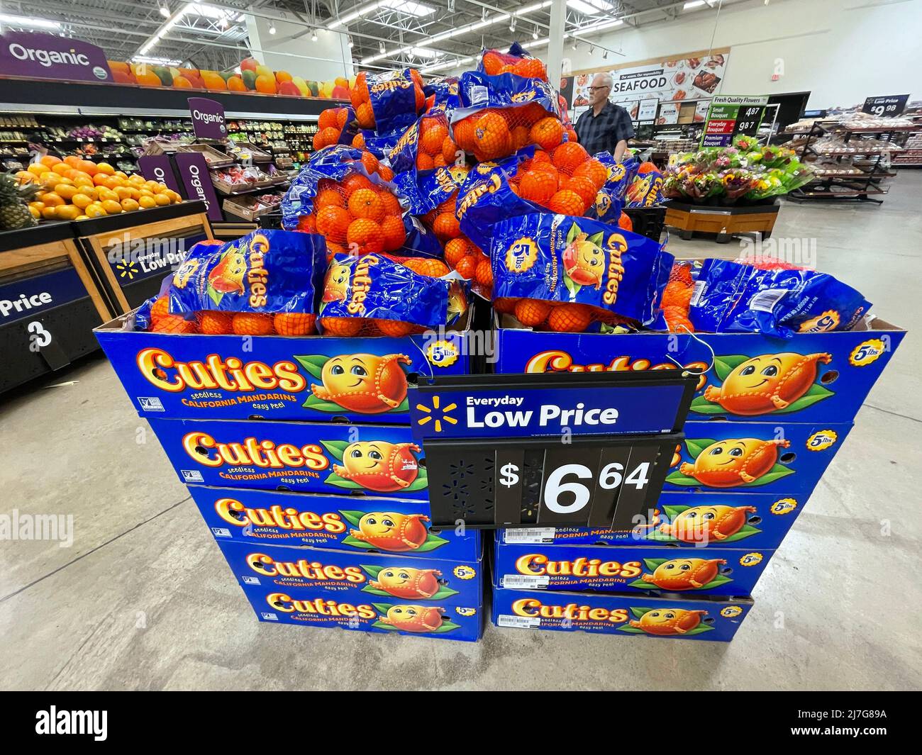 Grovetown, Ga USA 04 20 22 Walmart produce area Cuties Mandarins on display and price sign