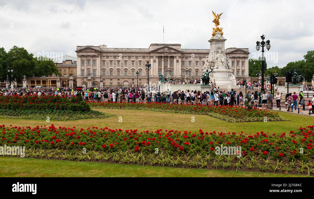 London, United Kingdom - June 30, 2010  : Buckingham Palace Memorial Gardens before Victoria Memorial and Buckingham Palace on a busy tourist day. Stock Photo