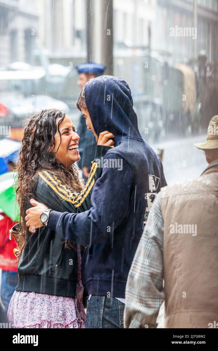 Young couple in the rain. Brussels. Stock Photo