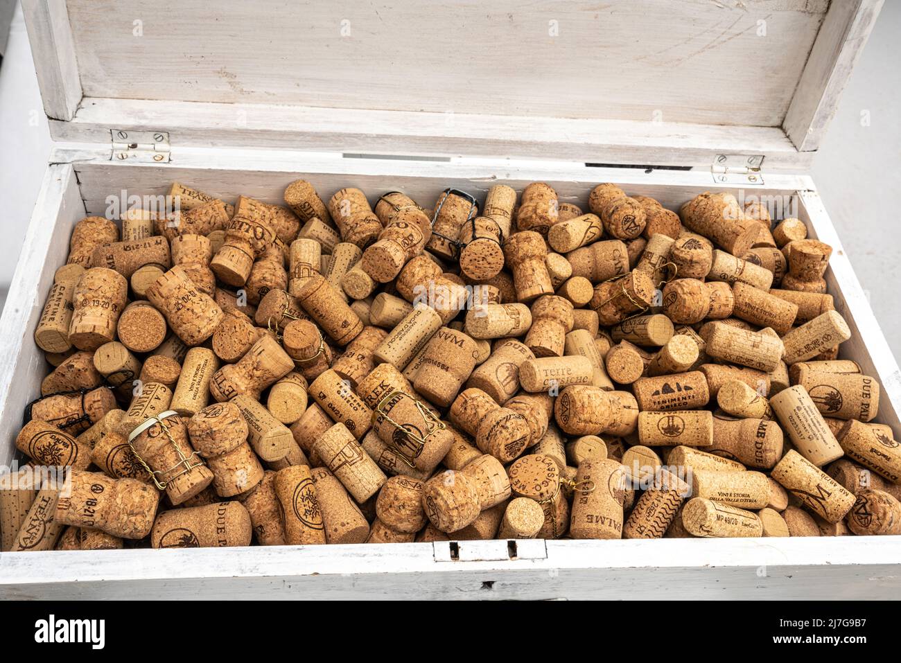 Corks of wine and sparkling wine bottles in a white case. Peschici, Foggia province, Puglia, Italy, Europe Stock Photo