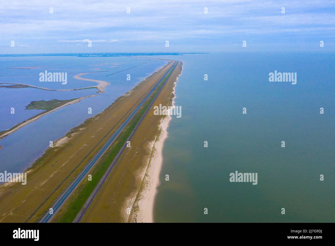 Aerial view of an artificial island called Houtribdijk in Lake Markermeer.  The highway dyke N302 from Lelystad to Enkhuizen. Flevoland, Netherlands. Stock Photo
