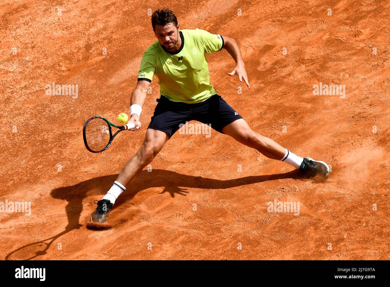 Rome, Italy. 09th May, 2022. Stanislas 'Stan' Wawrinka returns to Reilly  Opelka of United States during their first round match at Tennis  Internazionali BNL D'Italia at Foro Italico on May 9th, 2022