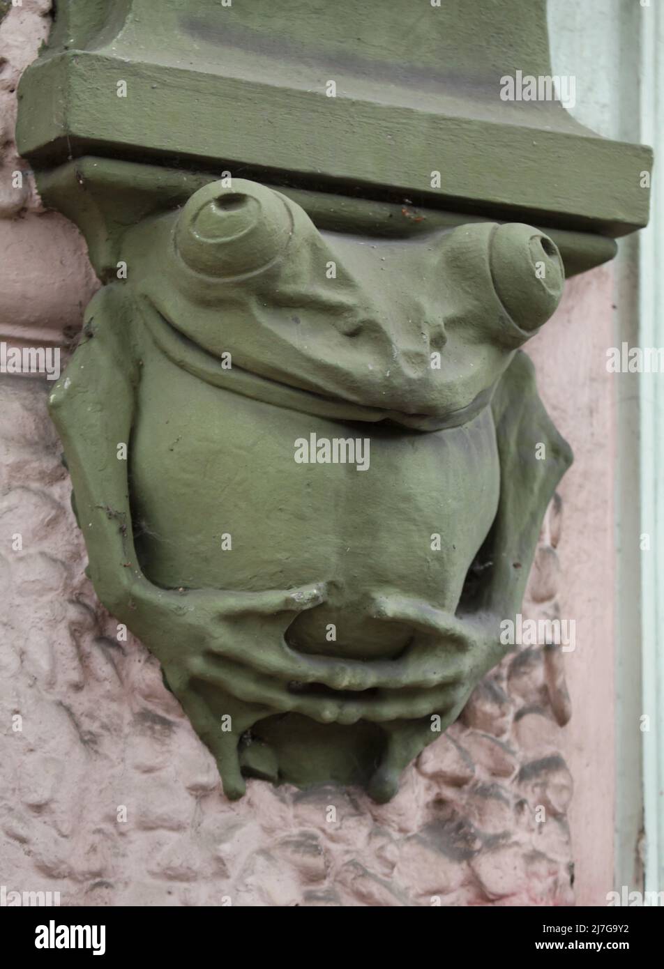 Funny frog depicted on the console on the revenue house in Ruská Street in Vršovice district in Prague, Czech Republic. The Art Nouveau building designed by Czech architect Osvald Polívka was completed between 1905 and 1906. Stock Photo