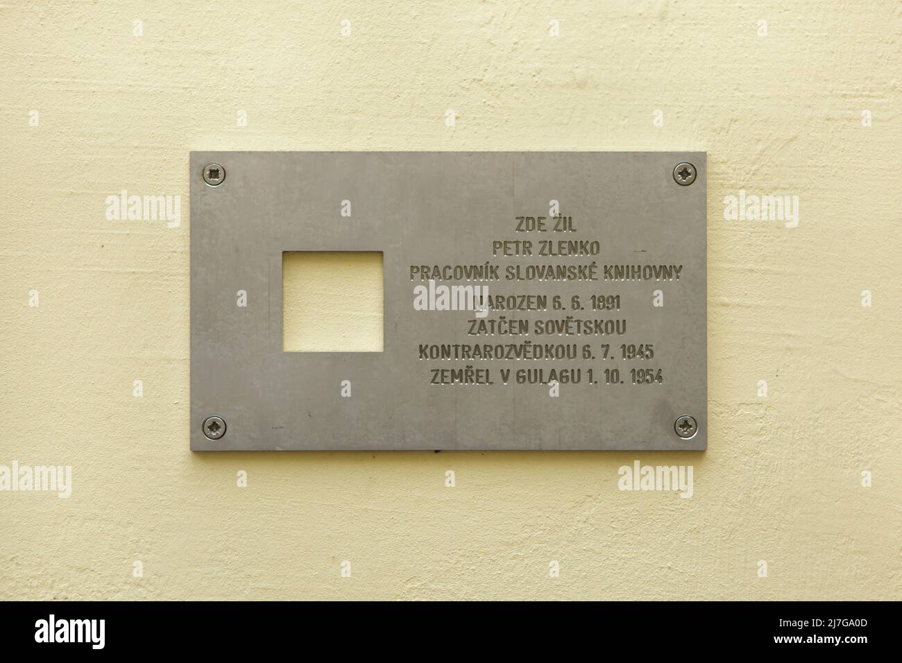 Commemorative plaque devoted to Ukrainian emigrant Petr Zlenko (1891-1954) on the house where he lived until his arrest in Vinohrady district in Prague, Czech Republic. Petr Zlenko was arrested in this house by the SMERSH (Soviet military counterintelligence service) on 6 July 1945 and died in the Gulag on 1 October1954. Text in Czech means: Petr Zlenko, an employee of the Slavonic Library (Slovanská knihovna), lived here. Born on 6 June 1891. Arrested by the Soviet counterintelligence service on 6 July 1945. Died in the on 1 October 1954. The plaque is a part of the civic initiative 'Last Add Stock Photo