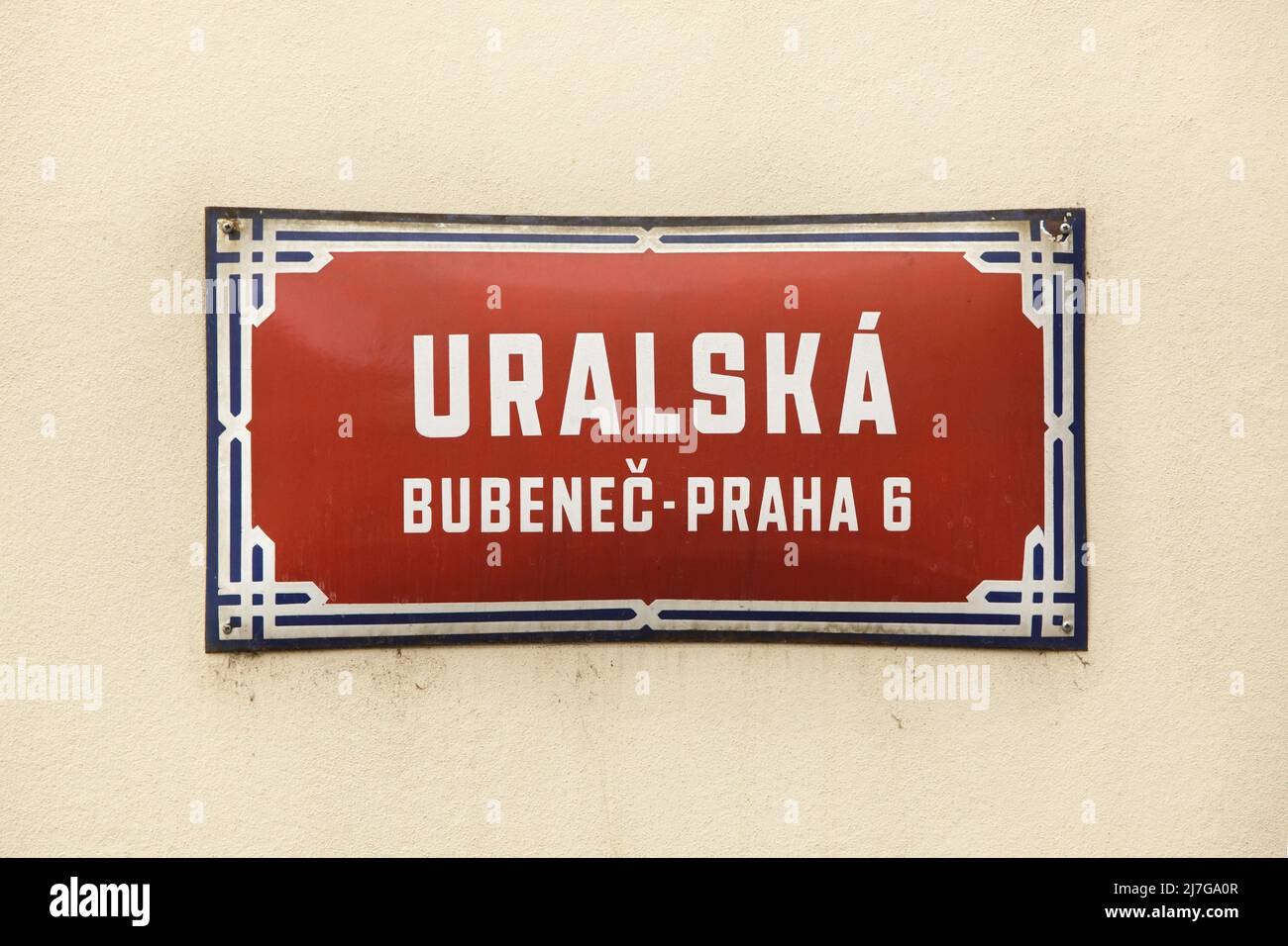Uralská Street. Traditional red street sign in Bubeneč district in Prague,  Czech Republic. The street is named after the Ural Mountains in Russia  Stock Photo - Alamy