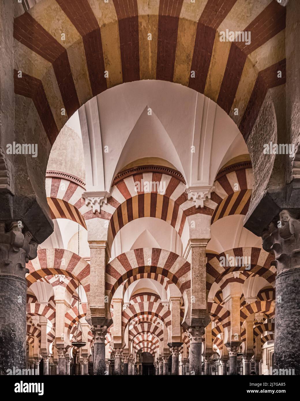Inside the famous Mezquita with his stunning architecture. The Mosque–Cathedral of Córdoba is the cathedral of the Roman Catholic Diocese of Córdoba d Stock Photo