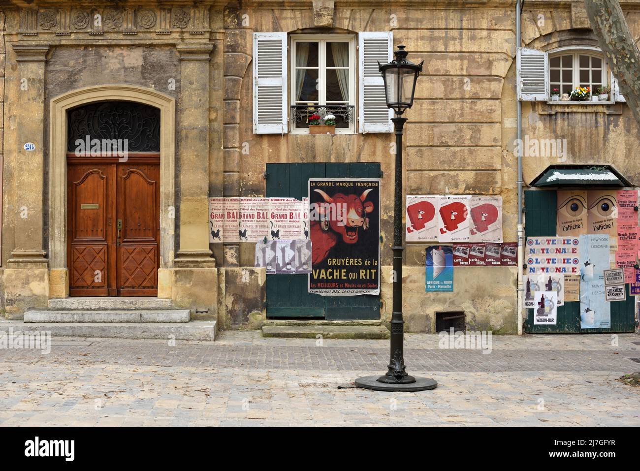 Old Facade and Vintage Posters in Town Square in the Old Town or Historic District Aix-en-Provence Provence France Stock Photo
