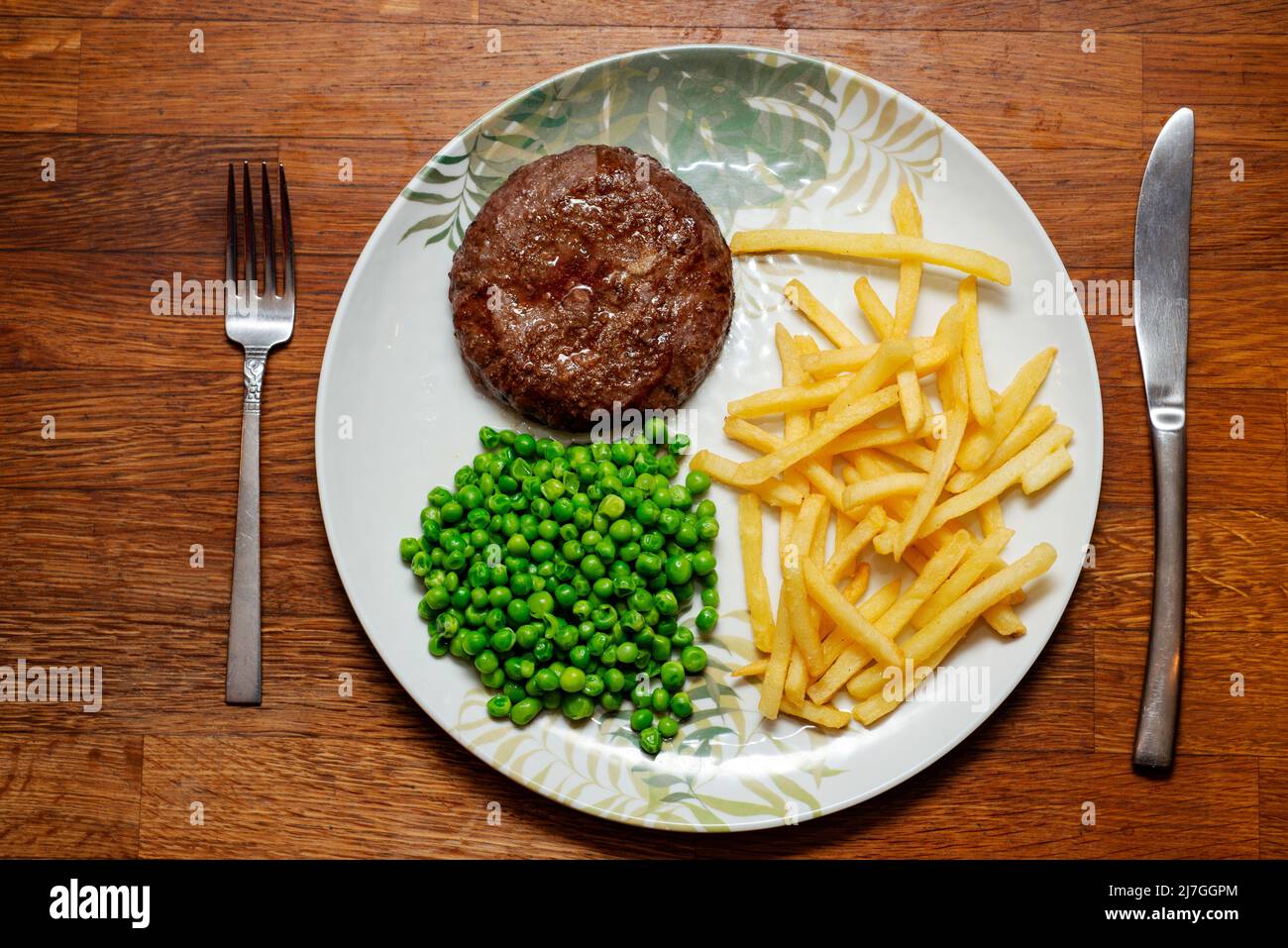 Beef burger chips and peas Stock Photo Alamy
