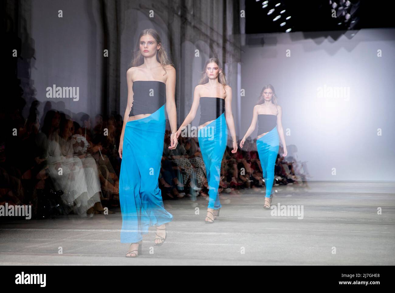 Sydney, Australia. 9th May, 2022. Multiple exposure photo shows a model walking on catwalk during the Afterpay Australian Fashion Week (AAFW) in Sydney, Australia, on May 9, 2022. The AAFW kicked off on Monday with an array of local brands showcasing their resort collections in Sydney. Credit: Bai Xuefei/Xinhua/Alamy Live News Stock Photo