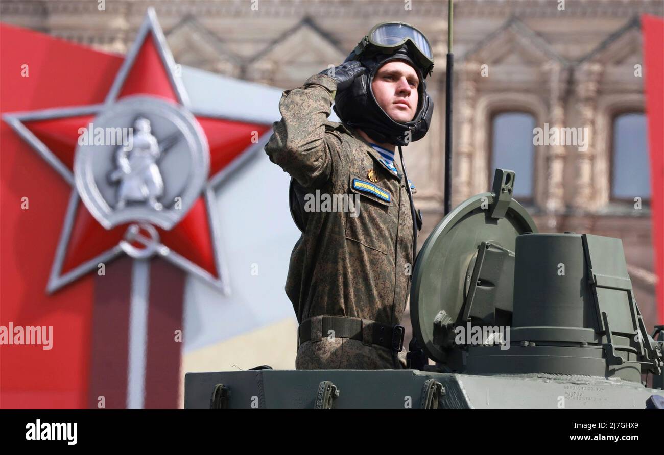 Moscow, Russia. 09th May, 2022. A Russian soldier salutes as he passes the review stand during the 77th annual Victory Day military parade celebrating the end of World War II at Red Square, May 9, 2022 in Moscow, Russia. Credit: Mikhail Metzel/Kremlin Pool/Alamy Live News Stock Photo