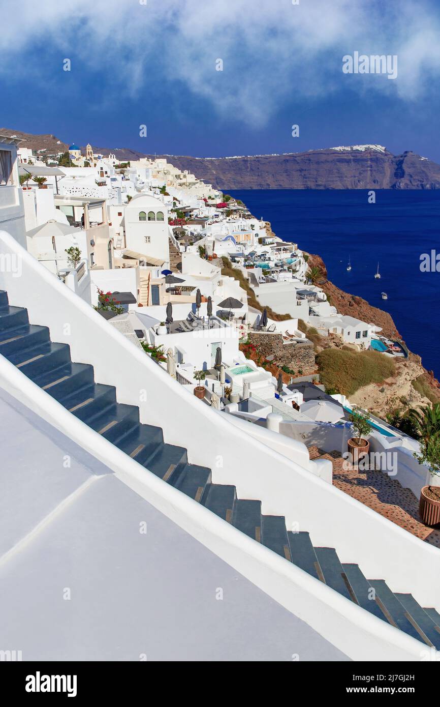 Traditional greek white houses on Santorini coast near the Aegean Sea ...