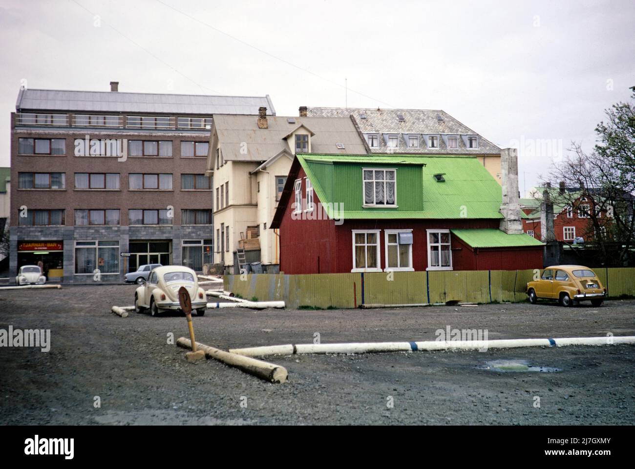 Contrast bewteen corrugtaed iron historic builidng and modern buildings, Reykjavík, Iceland 1972 Stock Photo