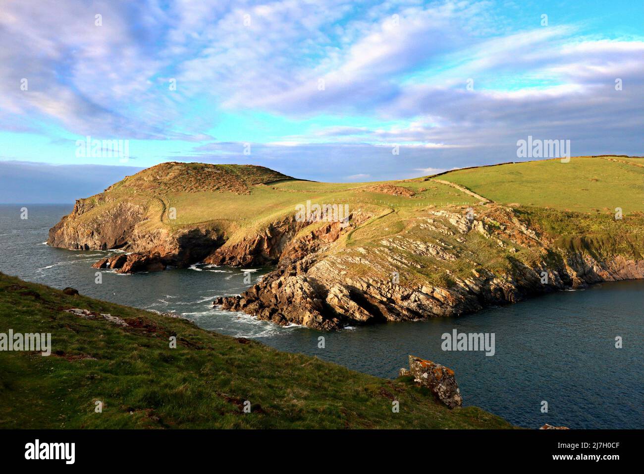 Kellan Head taken from Doyden Point at Port Quin, shortly before sunset. Stock Photo