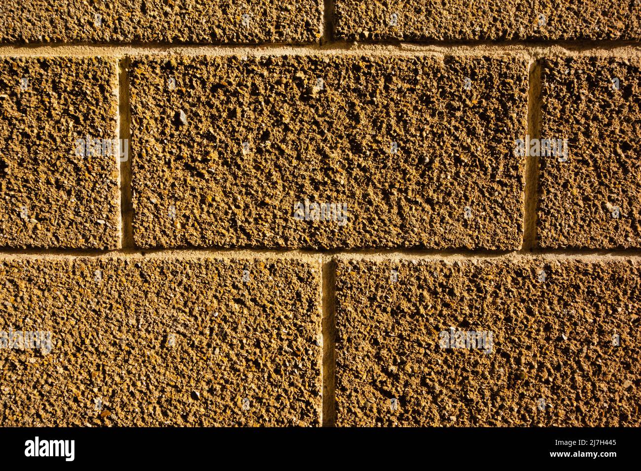 cream coloured textured brick wall Stock Photo Alamy